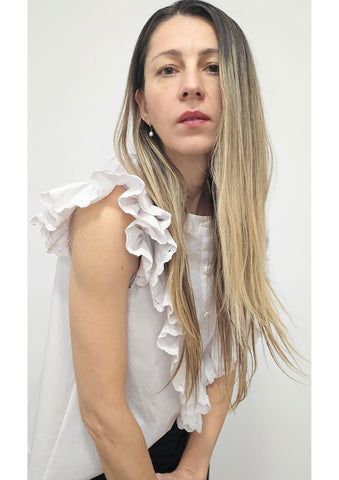 White ruffled blouse